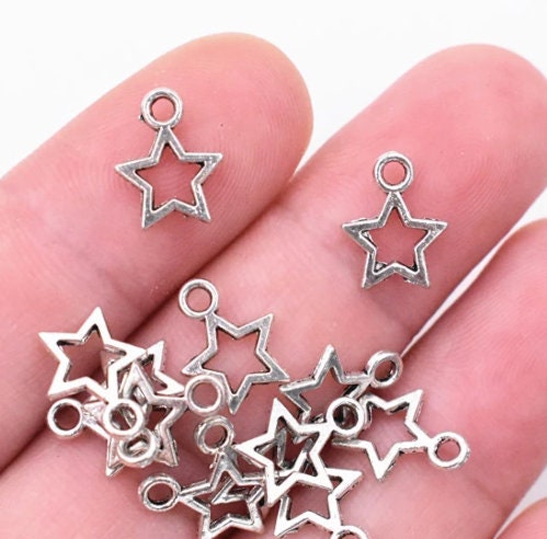 BULK Star Charms | Wholesale Star Charms | Pack of 25 Charms | Patriotic Charms | Military Charms | Celestial Charms | Size:  12mm x 9mm